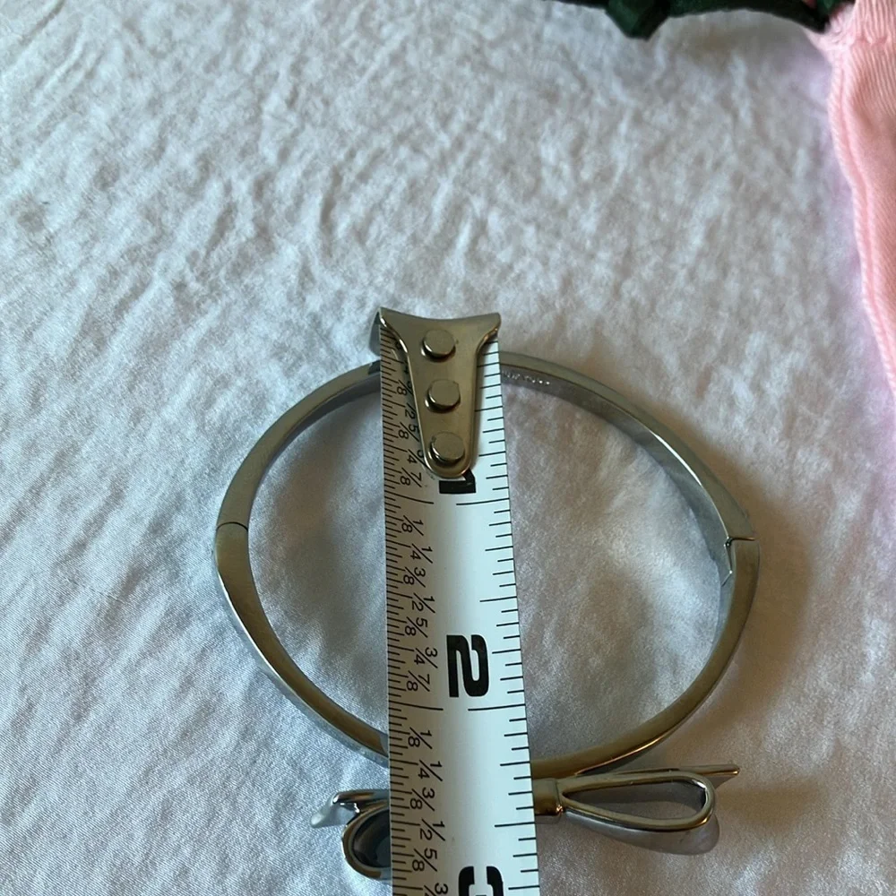 Kate Spade: Silver Tone Bracelet with Bow- Side Clasp - Picture 11 of 16